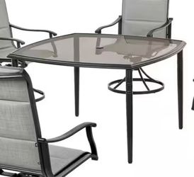 Metal and glass patio table