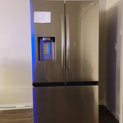 Refrigerator and Stack Washer/Dryer 