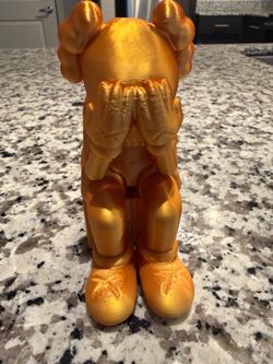 Kaws sculpture
