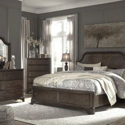 Adinton Brown Footboard Storage Platform Bedroom Set

