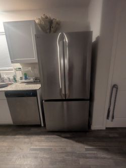 Refrigerator & bed with fireplace head board