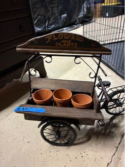 Old bicycle, pulling flower cards