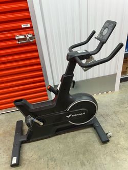 black, stationary bicycle, no seat Merach black, stationary bicycle, no seat