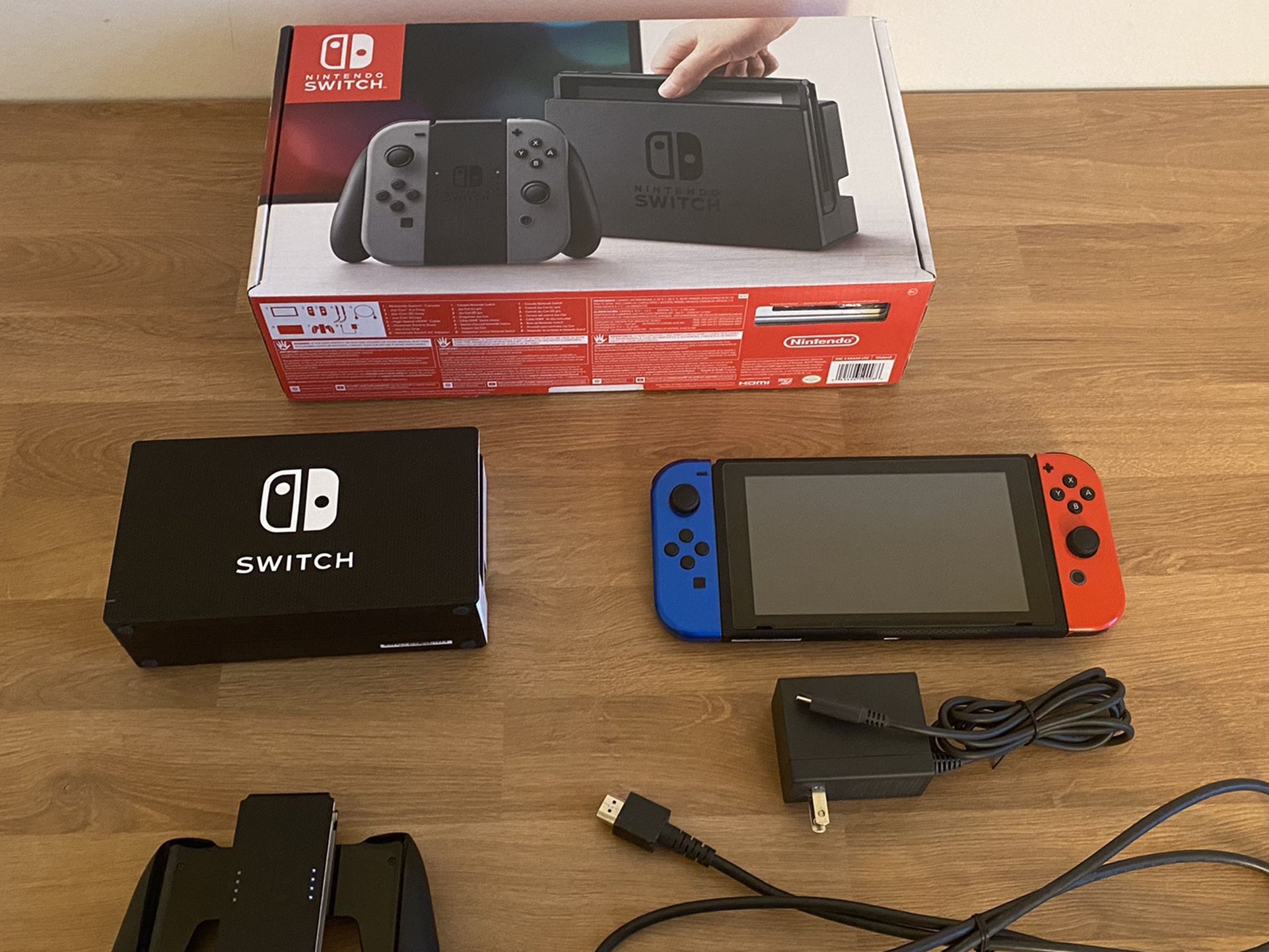 Nintendo Switch With Gray Joy-Con and Dbrand Skin
