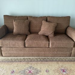 Brown Sofa And Loveseat With Pull Beds