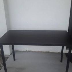 Table Dark brown 55 W X 24 D X 30 H Inches 