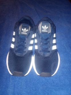 Adidas Gray/Black/Orange colorway.