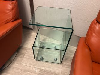 Glass side table with wheels