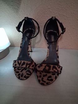 Dolce & Gabana heels cheetah print. Black and gold.  Size 7.5