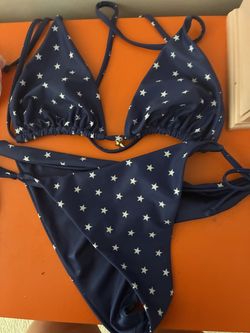 Blue bathing suite with white stars