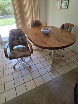 Vintage Wooden Dining Table and 4 Swivel Chairs Set