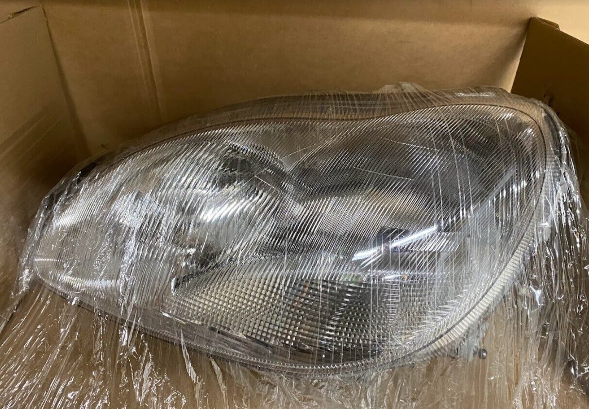 Hella Left Headlight - #1EL 010 055-031 / 010055031