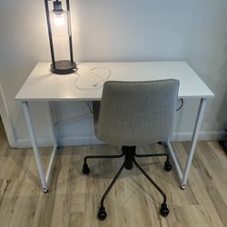 Desk, Lamp And Chair 