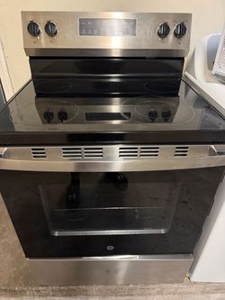 GE electric stove (( semi new ))