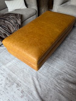 SIMPLIHOME Morrison 49" Wide Genuine Leather Rectangle Ottoman in Sienna