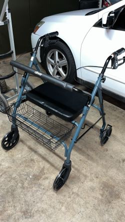 Drive walker with seat