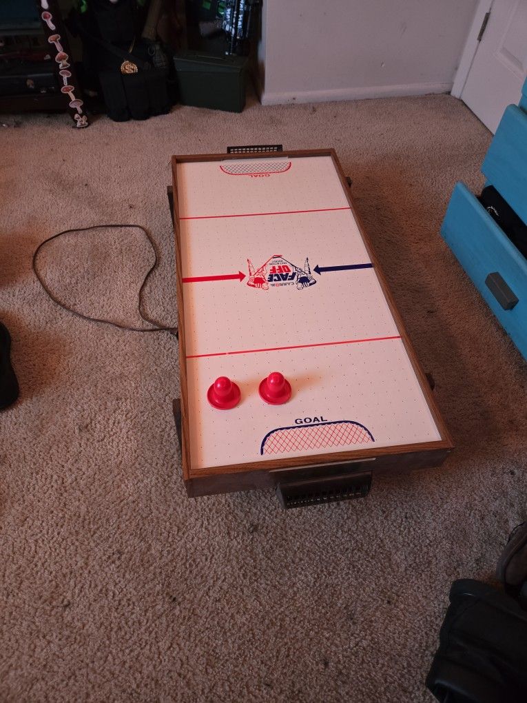 vintage plug in air hockey table