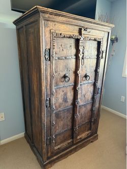 Carved Wood Armoire with Iron Hardware