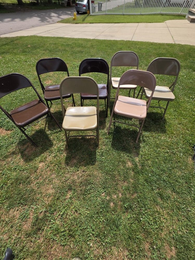 Seven metal chairs are available for purchase at a price of $25.