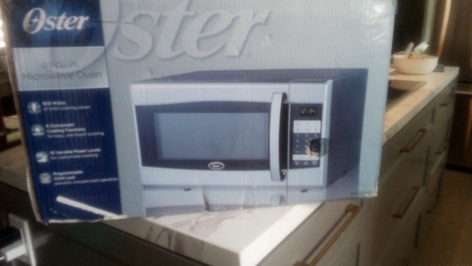 Microwave .9 Cu Oster