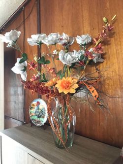 Big decorative boutique flowers display with glass vase tall fall style