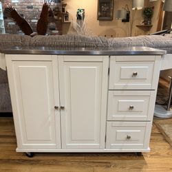 Mobile kitchen island with stainless steel top on Wheels
