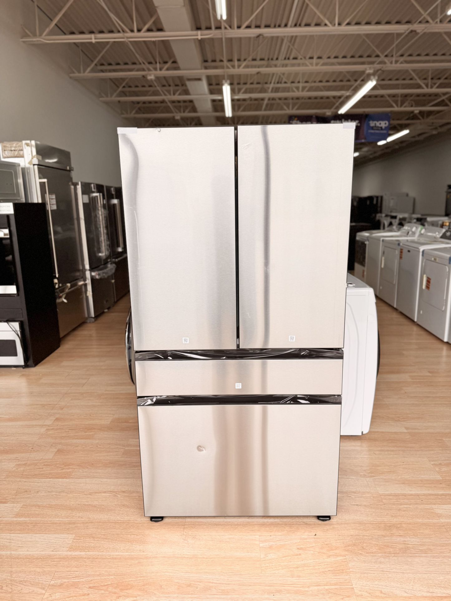 New Samsung BESPOKE 23 cu. ft. 4-Door Counter-Depth Smart Fridge with Beverage Center – Stainless Steel (RF23BB8600QLAA)