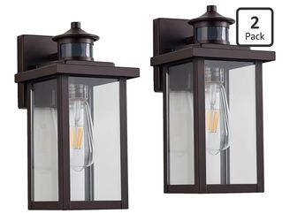 New outdoor wall lights. Two pack has motion sensors. Lights are bronze exterior wall sconces with clear glass. Each light has an Edison-style LED bul