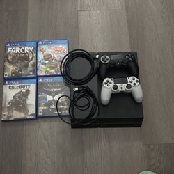 PlayStation 4 With All Needs To Play And Physical Games