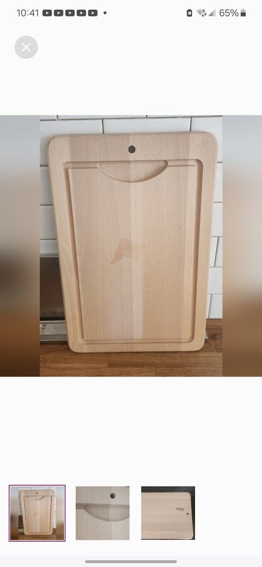 Wood cutting board 18" x 12" New Ikea marked asis on back. 3.4" thick.