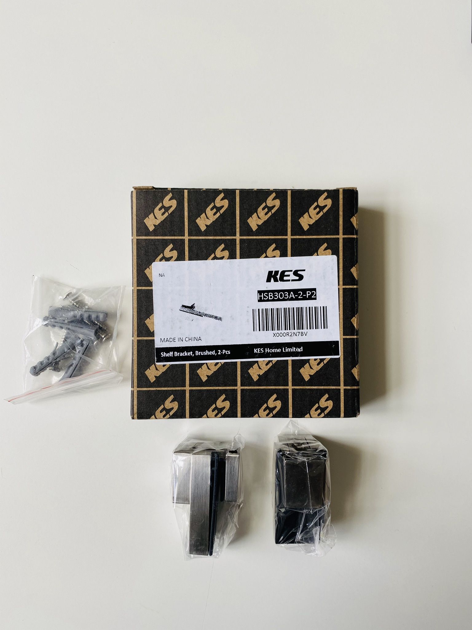 KES Shelf Brackets. Brushed finish. 2 Pcs. Ideal to put glass on. Or any other kind of shelf. New. Still sealed in original packaging. 3 for $30.