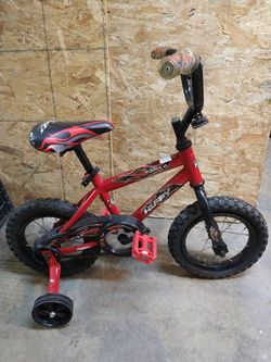 HUFFY...TRAINING WHEEL BIKE...