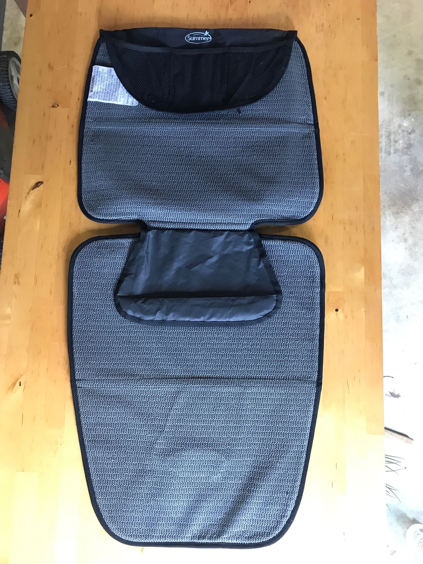 Two Summer brand seat protectors for under car seats