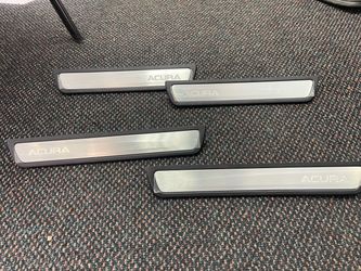 Acura door sill scuff plate logo.