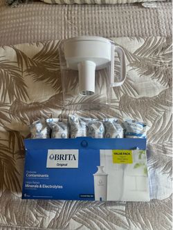 New! Brita water pitcher + 6 water filters. New!