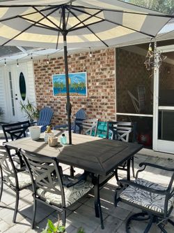 FREE USED table and 6 chairs with cushions and umbrella -needs some rehab and cleaning up.  MUST pickup and haul away