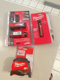 Milwaukee New Lights And Tape Measure All For $100