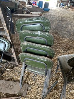 Vintage green stacking chairs.