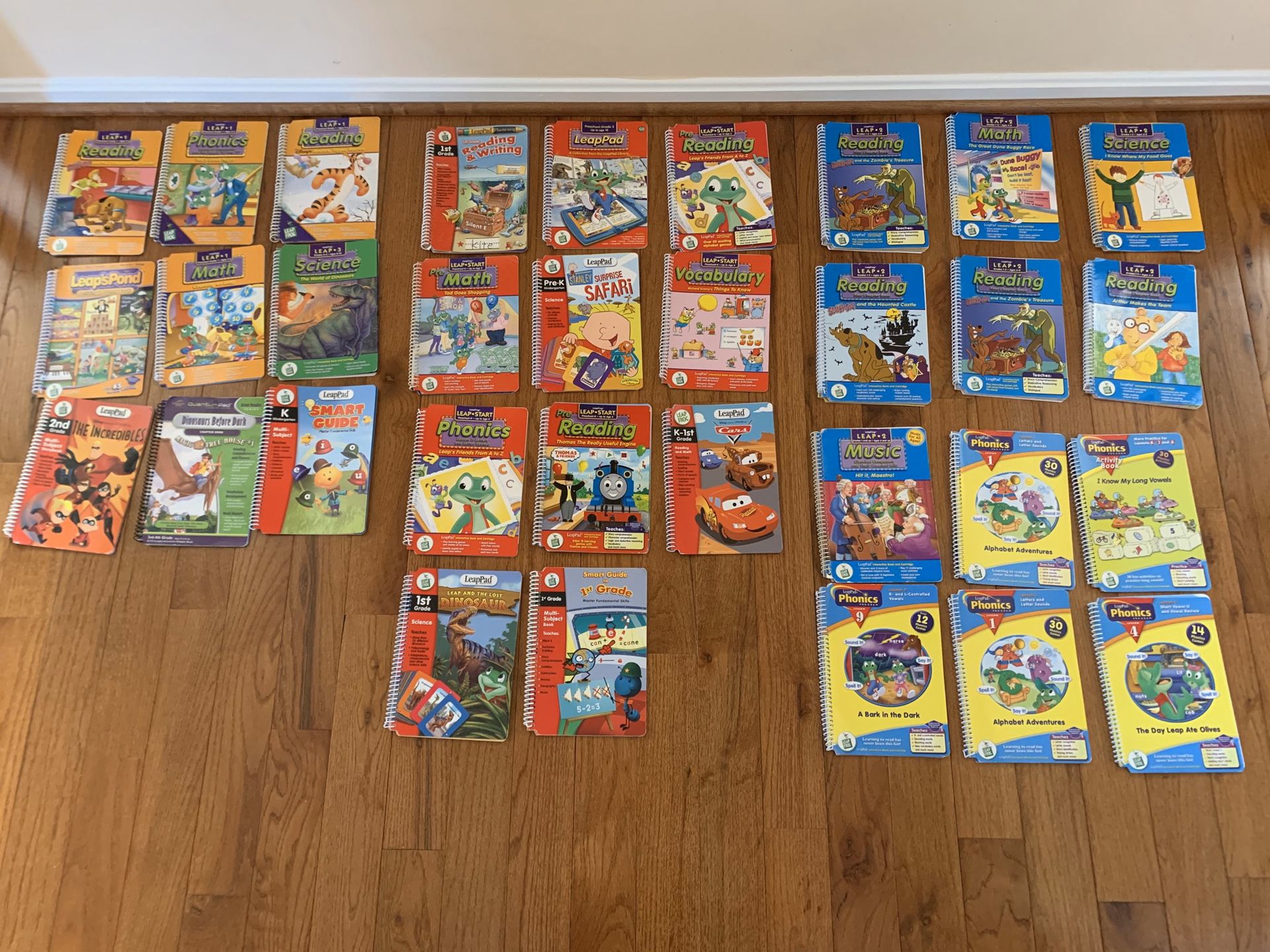 Leap Frog Read & Write Pad and 34 books and cartridges