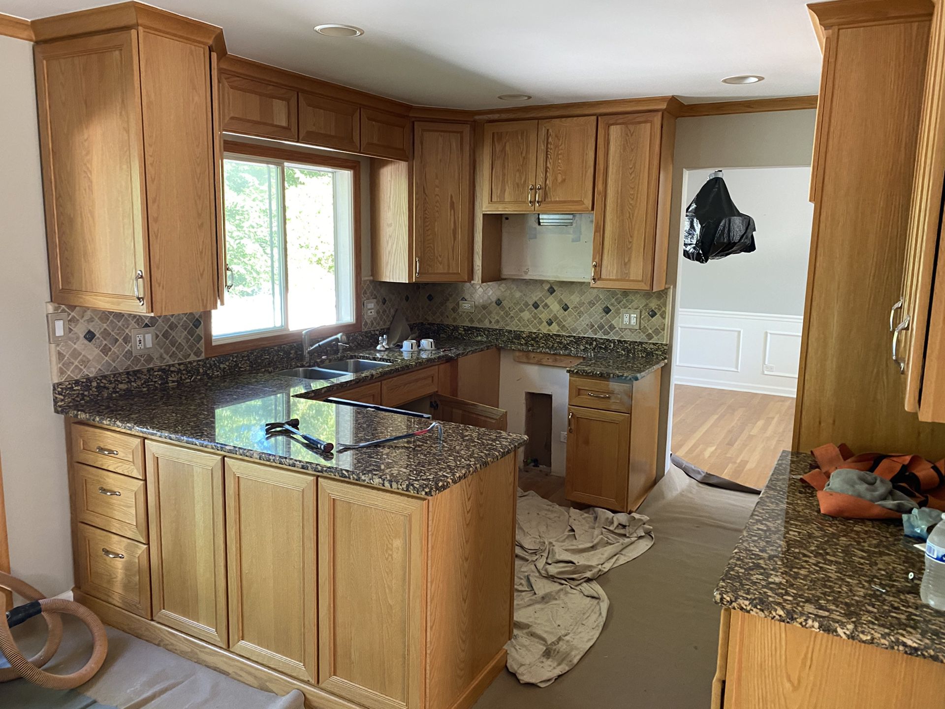 Kitchen cabinets with countertops, sink