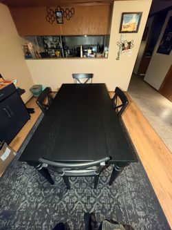 Wood Table- IKEA 4-6 seater. Built in leaf.