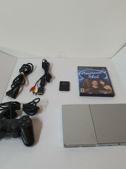 Sony PlayStation 2 Slim PS2 Silver Console (SCPH-90001) Bundle , Pre-owned.. Condition is "Used".tested/working, it comes with 1cord, 1 controller, 8