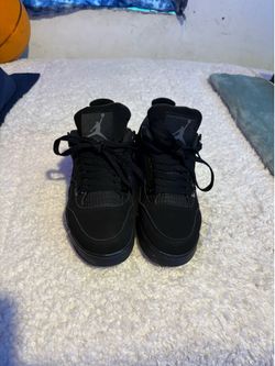 Black cats Jordan 4s