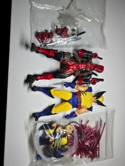 Mezco Wolverine & Revoltech Deadpool