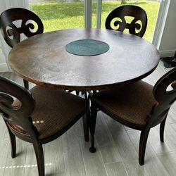 Arhaus - Hammered Copper Top Dining Table
