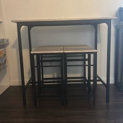 Table And 4 Stools 