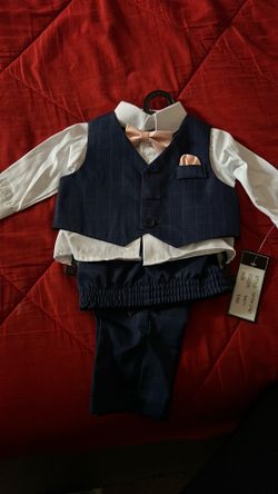 Baby tucksido size 6/9 months