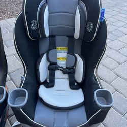 TWO Graco Extend2Fit Convertible Car Seats