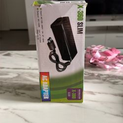 AC adapter power supply for the Microsoft Xbox 360 Slim console. 