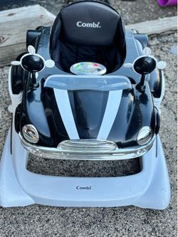 Baby walker.  Steering wheel lights up and plays music